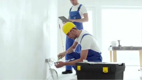 Contractors working on an interior renovation